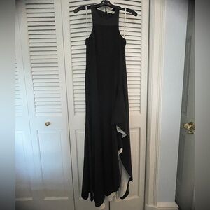 Halston gown with white ruffle detail. Worn once